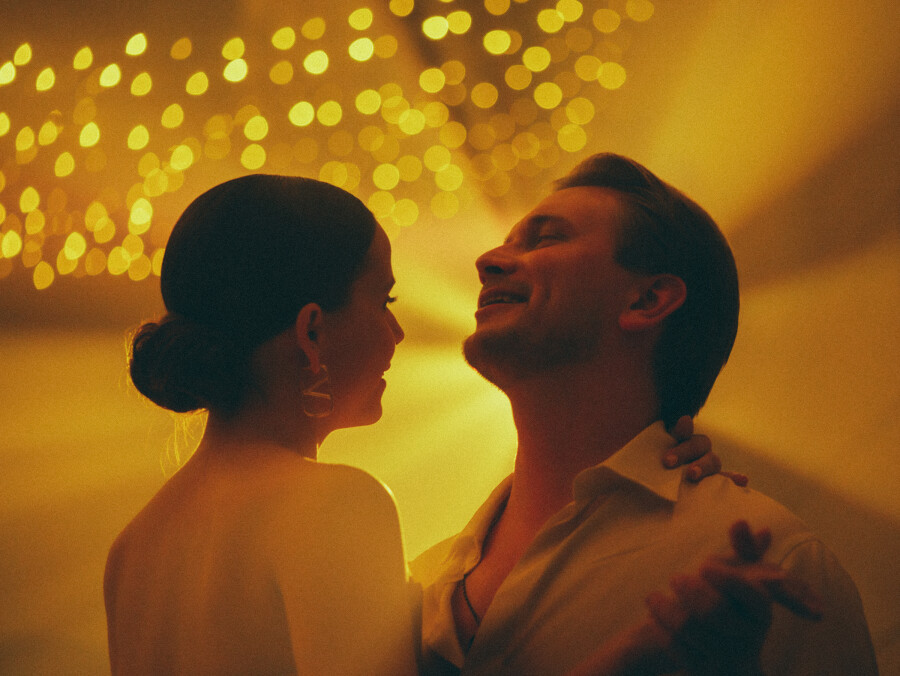 A Whimsical Wedding with a Giant Bow and Curved Tablescape