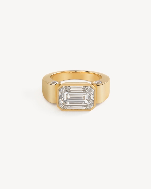 30 Emerald Cut Engagement Rings & Wedding Bands We're Loving Right Now