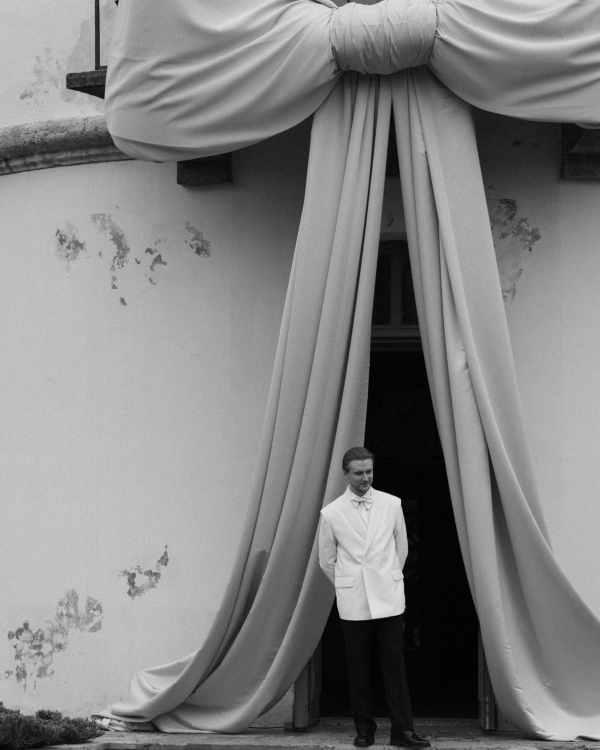 A Whimsical Wedding with a Giant Bow and Curved Tablescape