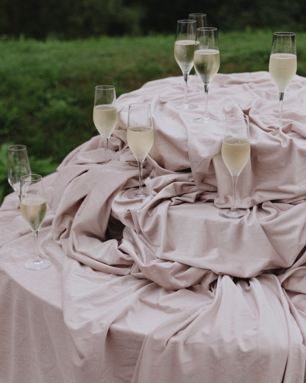 A Whimsical Wedding with a Giant Bow and Curved Tablescape