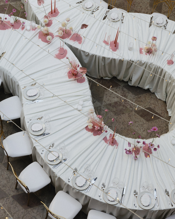 A Whimsical Wedding with a Giant Bow and Curved Tablescape