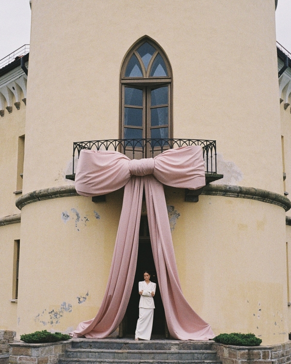 A Whimsical Wedding with a Giant Bow and Curved Tablescape