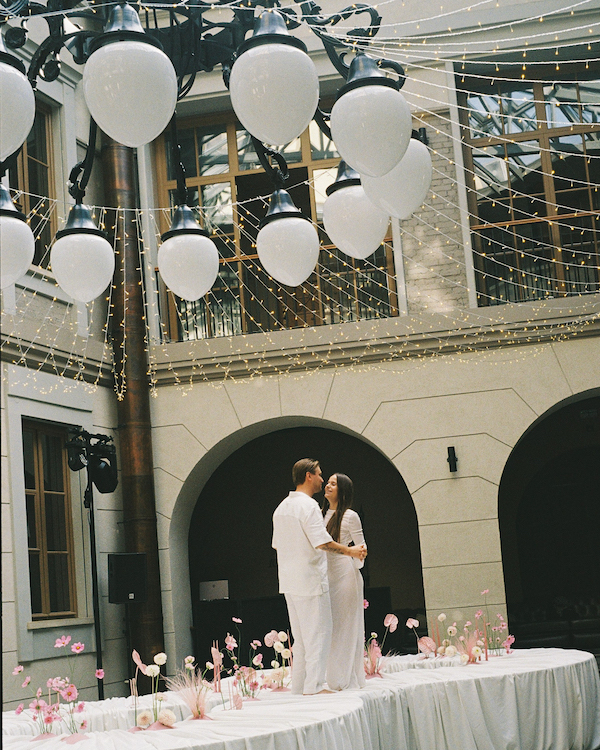 A Whimsical Wedding with a Giant Bow and Curved Tablescape