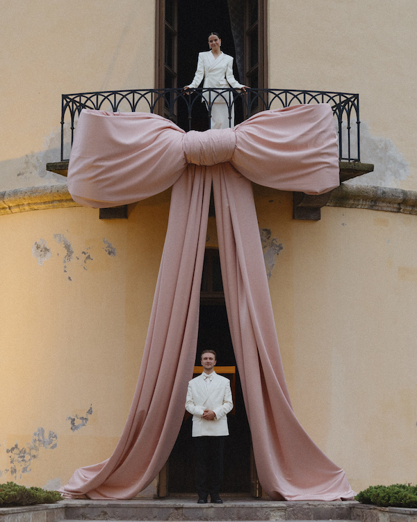 A Whimsical Wedding with a Giant Bow and Curved Tablescape