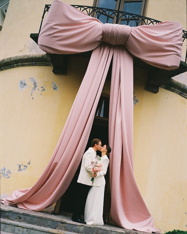 A Whimsical Wedding with a Giant Bow and Curved Tablescape